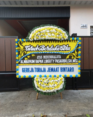 Papan Bunga Duka di Cigintung